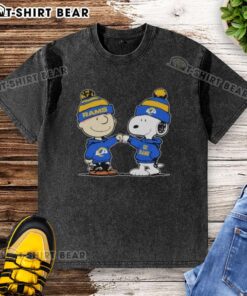 Official Los Angeles Rams Snoopy and Charlie Brown Best Friends washed t-shirt featuring vibrant graphics and team colors.