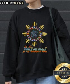 Official Miami Marlins X Hispanic sweatshirt featuring team logo and vibrant colors for fans and collectors.
