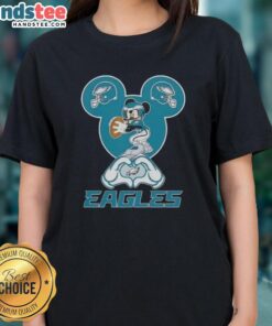 Alt Text: Official Mickey Hands Heart Love Philadelphia Eagles Football Ladies Tee featuring a vibrant graphic design.
