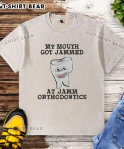 Leslie Knope wearing a washed t-shirt at Jamm Orthodontics with a playful expression, showcasing the 'My Mouth Got Jammed' theme.