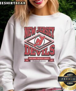 Official New Jersey Devils Heater Sweatshirt in black with logo, perfect for fans to show team spirit during games.