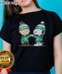 Official New York Jets Snoopy and Charlie Brown Best Friends Ladies Tee featuring vibrant graphics and team colors.