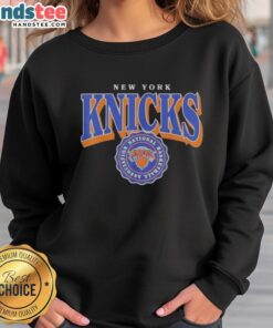 Official New York Knicks National Basketball Association sweatshirt featuring team logo and vibrant colors.