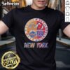 Alt Text: Official New York Knicks, Mets, Devils, Giants mashup logo t-shirt featuring iconic team logos and vibrant colors.