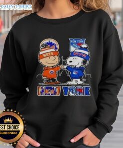 Official New York Mets and New York Rangers Snoopy sweatshirt featuring vibrant team colors and playful design.