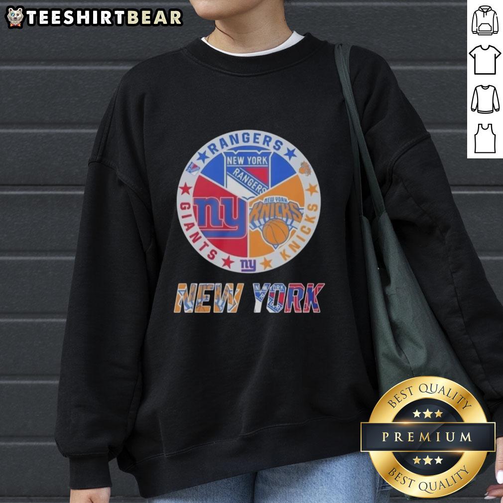 official-new-york-rangers-new-york-giants-new-york-knicks-mashup-logo-sweatshirt Alt Text: Official New York Rangers, Giants, and Knicks mashup logo sweatshirt featuring vibrant team colors and design.