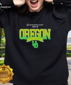 Alt Text: Official Oregon Ducks SCO Ducks 2025-26 College Football Playoff sweatshirt in vibrant green with logo.