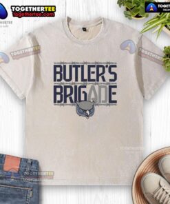 Official Owls Olathe West Football Butler's Brigade washed t-shirt featuring team colors and logo design.