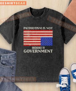Official Patriotism Is Not Obedience To Government t-shirt featuring a washed US flag design.