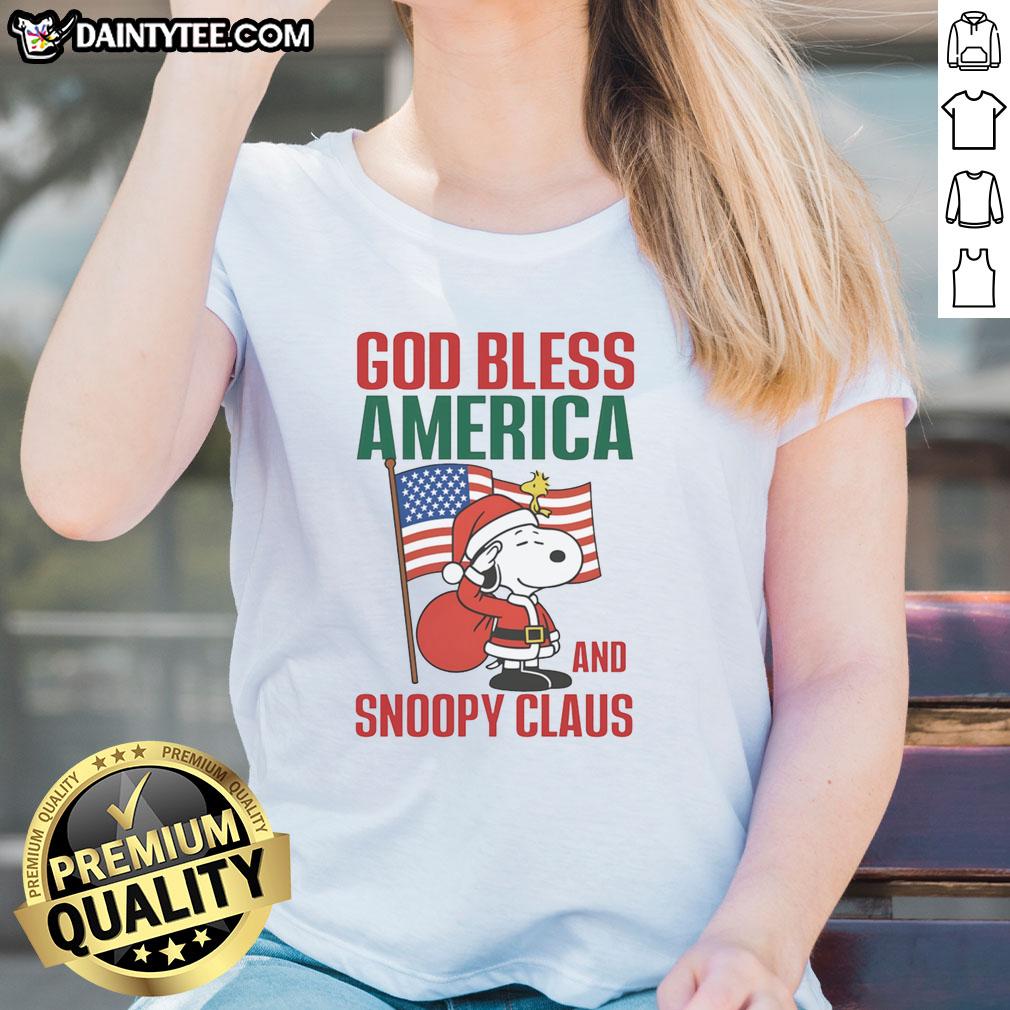 official-peanuts-god-bless-america-and-snoopy-claus-ladies-tee Official Peanuts God Bless America and Snoopy Claus ladies tee featuring festive Snoopy design for patriotic fans.