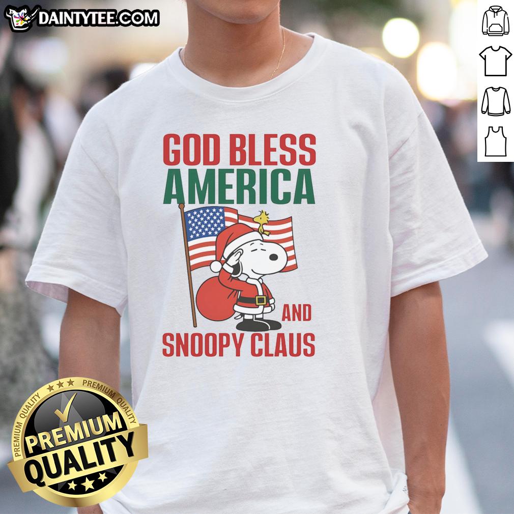 official-peanuts-god-bless-america-and-snoopy-claus-t-shirt Official Peanuts God Bless America and Snoopy Claus T-Shirt featuring Snoopy in festive holiday attire, perfect for Christmas.