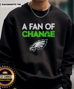 Alt Text: Official Philadelphia Eagles A Fan of Change sweatshirt showcasing team colors and logo for dedicated fans.
