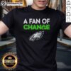 Official Philadelphia Eagles 'A Fan Of Change' T-Shirt featuring team logo and vibrant design for dedicated fans.