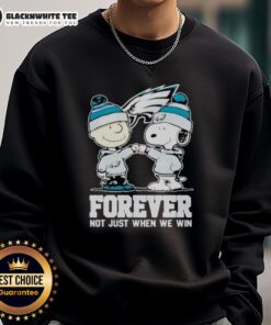 Alt Text: Official Philadelphia Eagles Charlie Brown and Snoopy sweatshirt featuring 'Forever, Not Just When We Win' slogan.