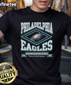Alt Text: Official Philadelphia Eagles Heater T-Shirt featuring team logo and vibrant design, perfect for fans on game day.