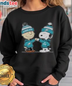 Alt Text: Official Philadelphia Eagles Snoopy and Charlie Brown Best Friends Sweatshirt featuring vibrant team colors and playful design.