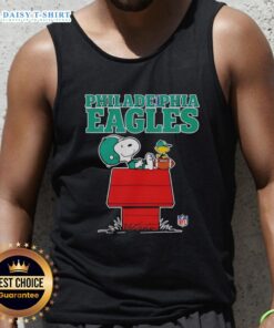 Official Philadelphia Eagles Snoopy tank top in Peanuts style, featuring Snoopy relaxing with a football.