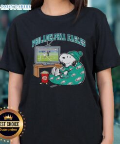 Official Philadelphia Eagles Snoopy cozy game day Peanuts style ladies tee featuring a fun graphic of Snoopy.