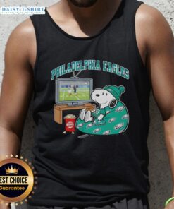 Official Philadelphia Eagles Snoopy cozy game day Peanuts style tank top featuring iconic cartoon design and team colors.