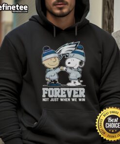 Alt Text: Official Philadelphia Eagles X Charlie Brown hoodie featuring Forever, Not Just When We Win slogan and team colors.