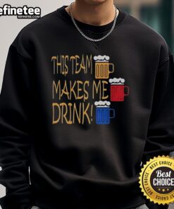 Official Pittsburgh Steelers 'This Team Makes Me Drink' sweatshirt featuring bold logo and comfortable design.