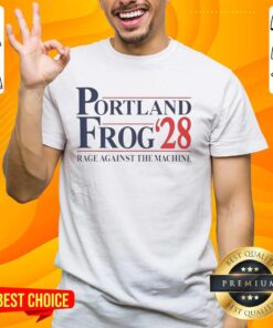 Alt Text: Official Portland Frog 2028 Rage Against The Machine T-Shirt featuring bold graphics and vibrant colors.