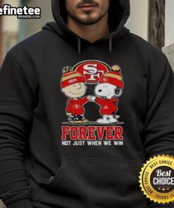 Alt Text: Official San Francisco 49ers X Charlie Brown Vs Snoopy hoodie featuring 'Forever Not Just When We Win' slogan.