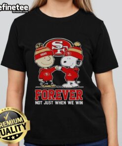 Official San Francisco 49ers X Charlie Brown Vs Snoopy Forever Ladies Tee showcasing team spirit and playful design.