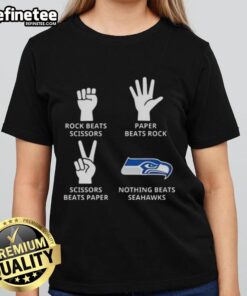 Alt Text: Official Seattle Seahawks ladies tee featuring 'Nothing Beats Rock, Scissors, Paper Beats Rock, Scissors Beats Paper' design.