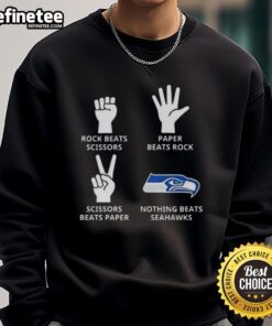 Alt Text: Official Seattle Seahawks sweatshirt featuring Nothing Beats Rock, Scissors, Paper Beats Rock, Scissors Beats Paper design.