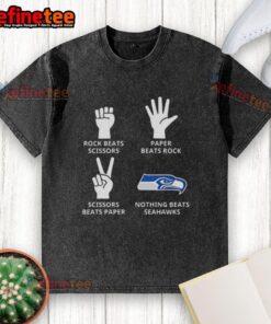 Official Seattle Seahawks t-shirt featuring 'Nothing Beats Rock, Scissors, Paper Beats Rock, Scissors Beats Paper' design.