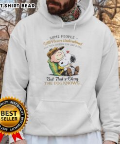Official Snoopy and Charlie Brown hoodie featuring the quote about love for dogs, perfect for dog lovers and fans.