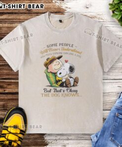 Official Snoopy and Charlie Brown washed t-shirt featuring the quote about loving a dog. Perfect for Peanuts fans!