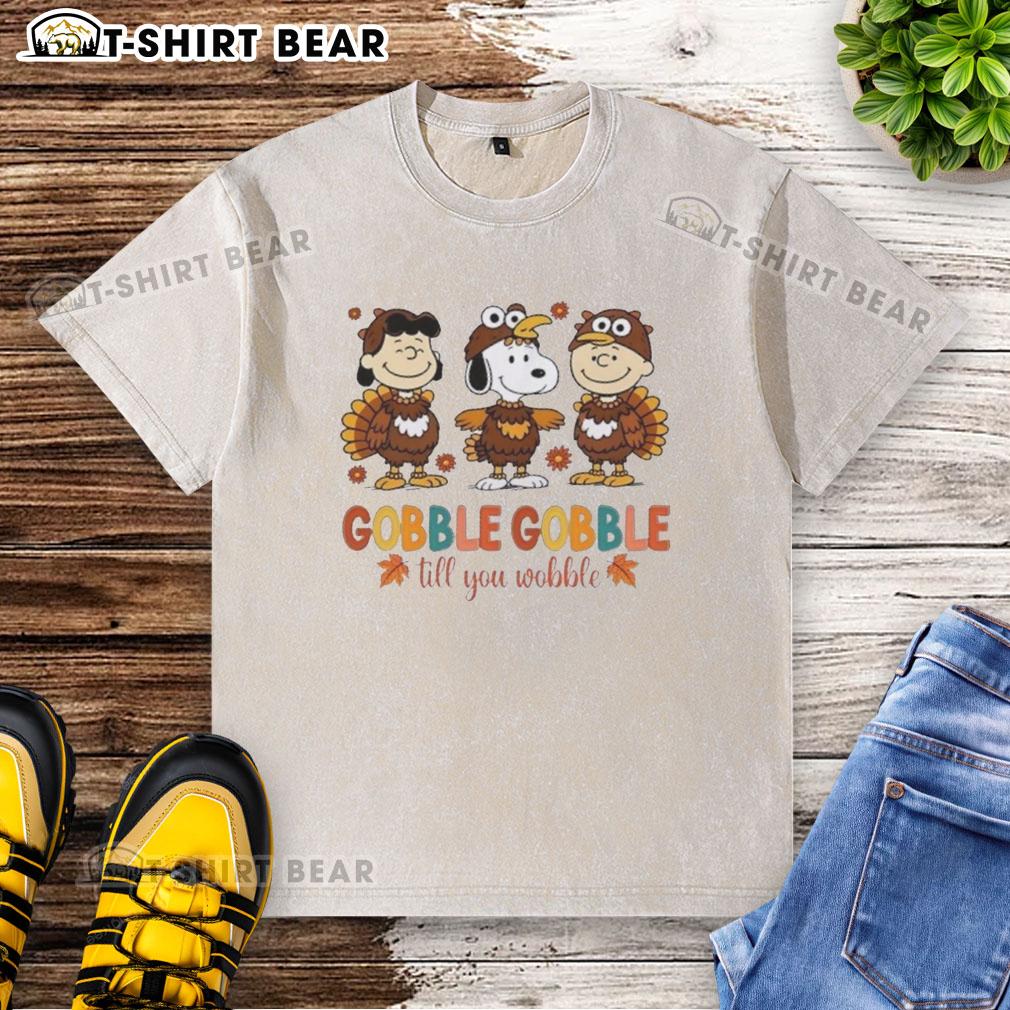 Official Snoopy And Friends Cosplay Turkey Gobble Gobble Till You Wobble Thanksgiving Washed T-Shirt Official Snoopy and Friends Thanksgiving T-shirt featuring a fun turkey design for cozy holiday cosplay.