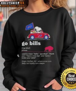 Alt Text: Snoopy driving a car on a Buffalo Bills sweatshirt, featuring phrases like 'Hello,' 'Goodbye,' and 'Have a Nice Day.'