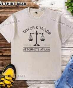 Official Taylor and Taylor Attorneys at Law Stremlow McCabe washed t-shirt, featuring a stylish logo and casual design.