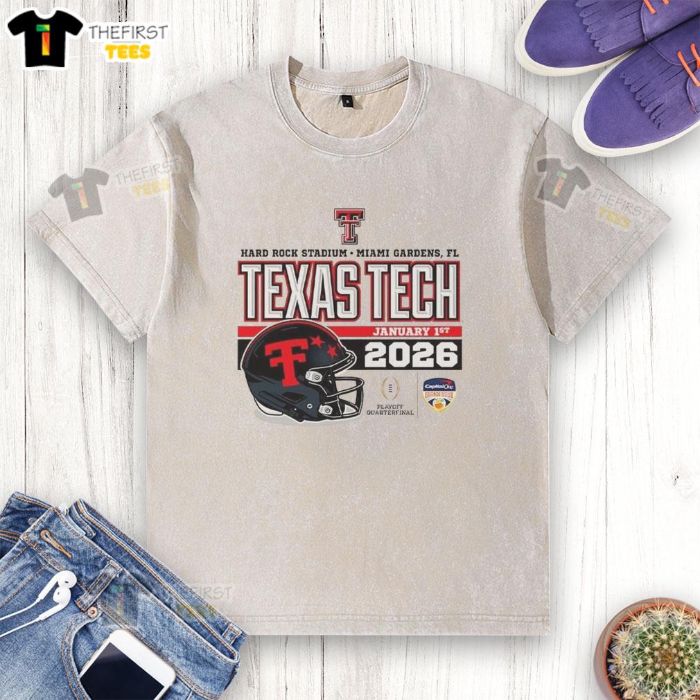 official-texas-tech-red-raiders-january-2026-cfp-hard-rock-stadium-helmet-washed-t-shirt Alt Text: Official Texas Tech Red Raiders January 2026 CFP helmet washed t-shirt displayed on a neutral background.