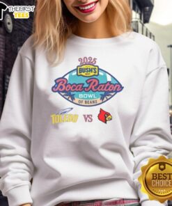 Alt Text: Official Toledo Rocket vs Louisville Cardinals 2025 Boca Raton Bowl matchup sweatshirt featuring team logos.