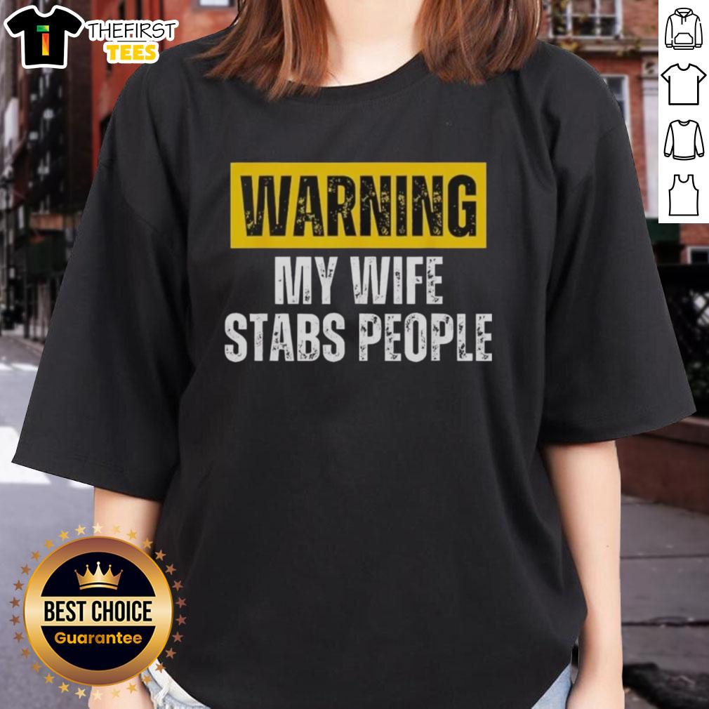 official-warning-my-wife-stabs-people-vintage-ladies-tee Vintage ladies tee featuring 'Official Warning: My Wife Stabs People' humorous graphic design for unique fashion statement.