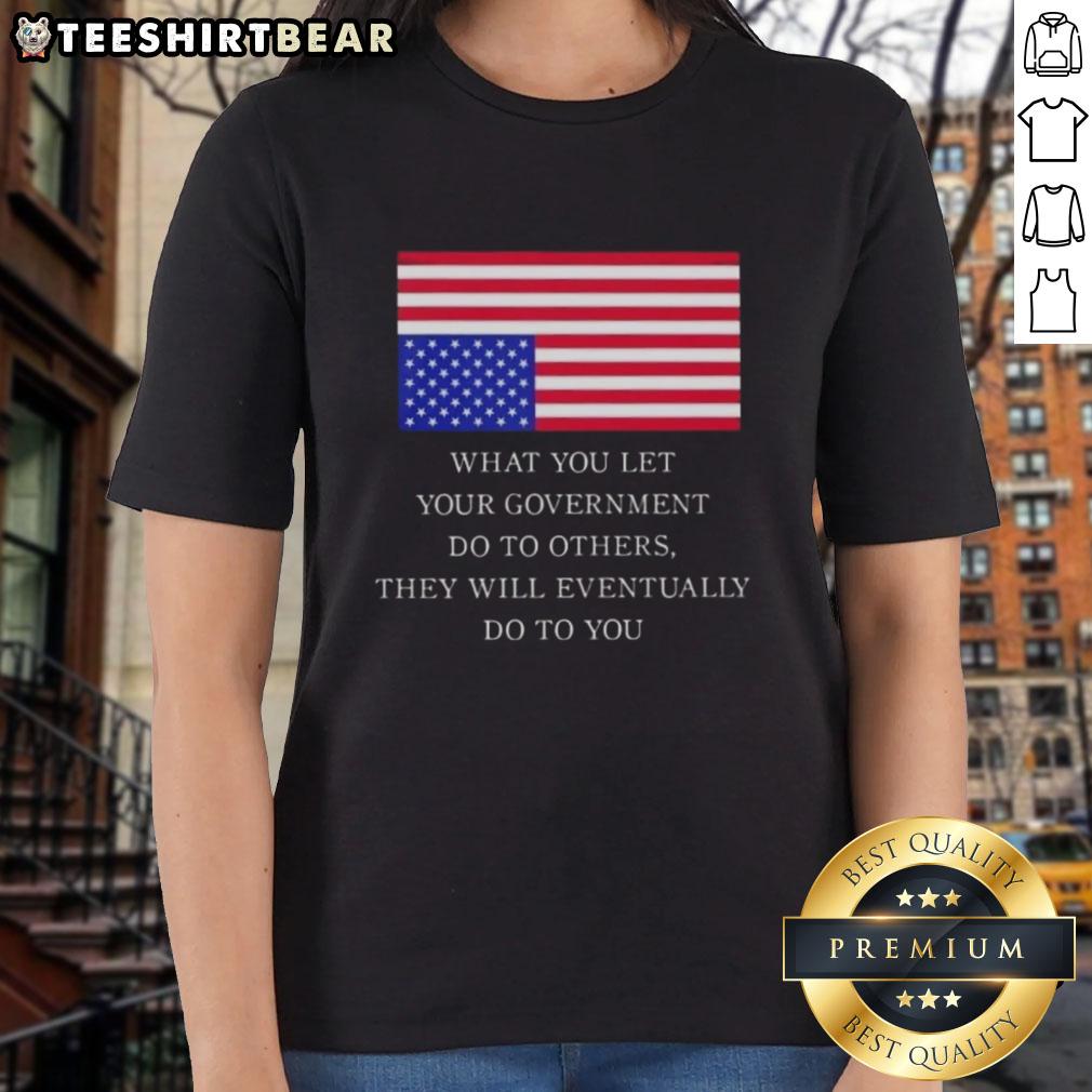 official-what-you-let-your-government-do-to-others-they-will-eventually-do-to-you-us-flag-ladies-tee Women wearing 'What You Let Your Government Do' tee with US flag design, promoting awareness and civic responsibility.