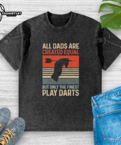 Alt Text: Vintage washed t-shirt with All Dads Are Created Equal But Only The Finest Play Darts graphic design.