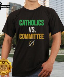Original Catholics vs Committee Notre Dame Fighting Irish T-Shirt featuring bold graphics and team colors for fans.
