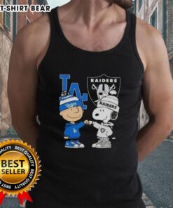 Alt Text: Original Charlie Brown fist bump with Snoopy, featuring Dodgers and Raiders, on a stylish tank top in Los Angeles.
