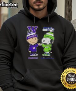Alt Text: Original Charlie Brown fist bump hoodie featuring Snoopy, combining Washington Huskies and Seattle Seahawks designs.