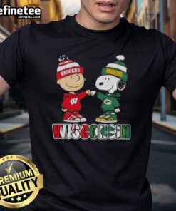 Original Charlie Brown fist bump with Snoopy on Wisconsin sports T-shirt featuring Badgers and Green Bay Packers logo.