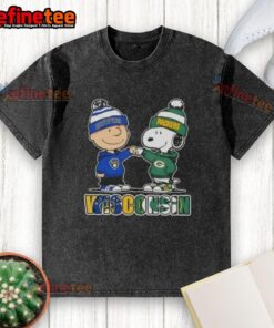 Alt Text: Original Charlie Brown fist bump with Snoopy on a washed t-shirt featuring Milwaukee Brewers and Green Bay Packers themes.