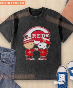 Original Charlie Brown Fist Bump Snoopy X Cincinnati Reds washed t-shirt featuring iconic characters in vibrant colors.