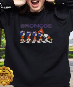 Alt Text: Original Denver Broncos X Peanuts Snoopy and Friends Abbey Road sweatshirt featuring iconic characters in team colors.