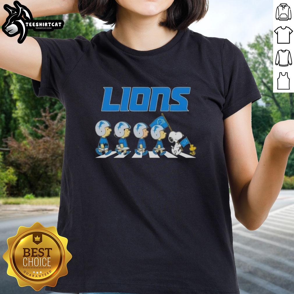 original-detroit-lions-x-peanuts-snoopy-and-friends-abbey-road-ladies-tee Original Detroit Lions X Peanuts Snoopy and Friends Abbey Road Ladies Tee featuring iconic characters and team logo.