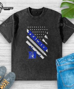 Alt Text: Original Duke Blue Devils X Teacher American Flag Washed T-Shirt featuring a patriotic design and Duke logo.